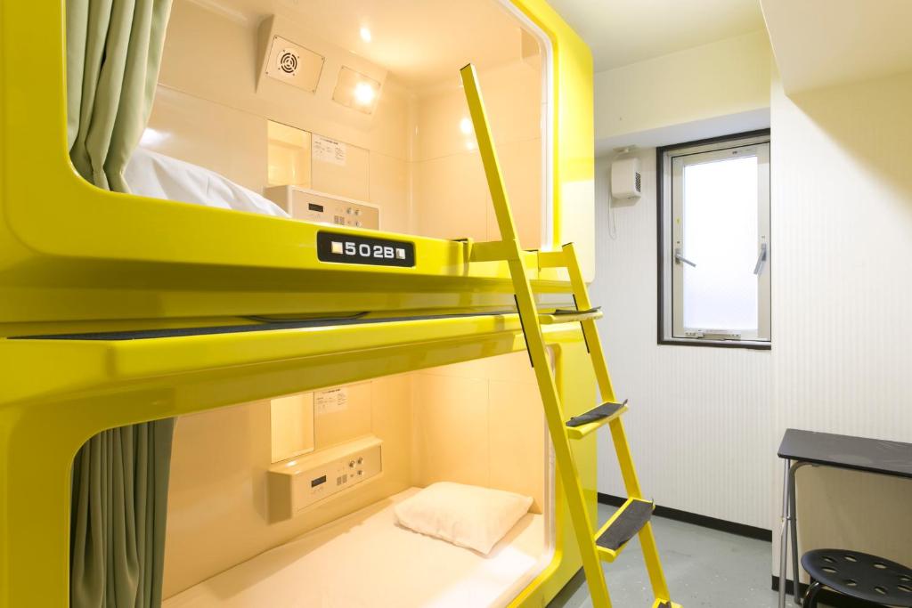 Palanda nebo palandy na pokoji v ubytování Hotel Shin-Imamiya