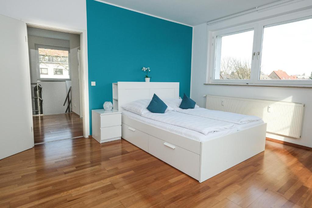 Ein Bett oder Betten in einem Zimmer der Unterkunft Apartment mit Wohnflair