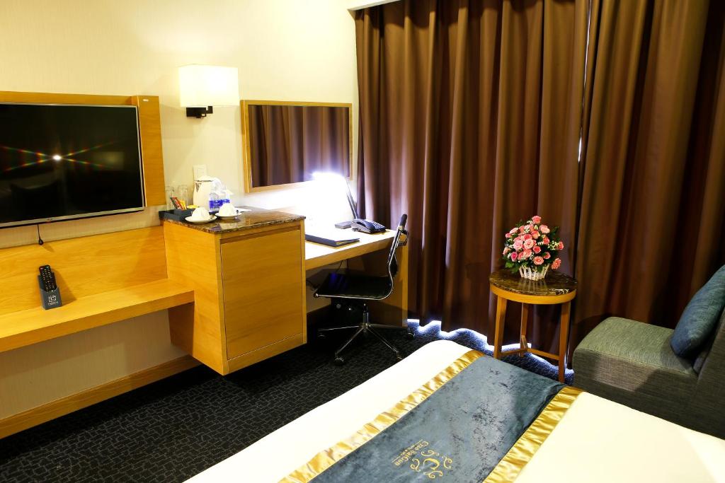 TV a/nebo společenská místnost v ubytování Ciao SaiGon Hotel & Spa