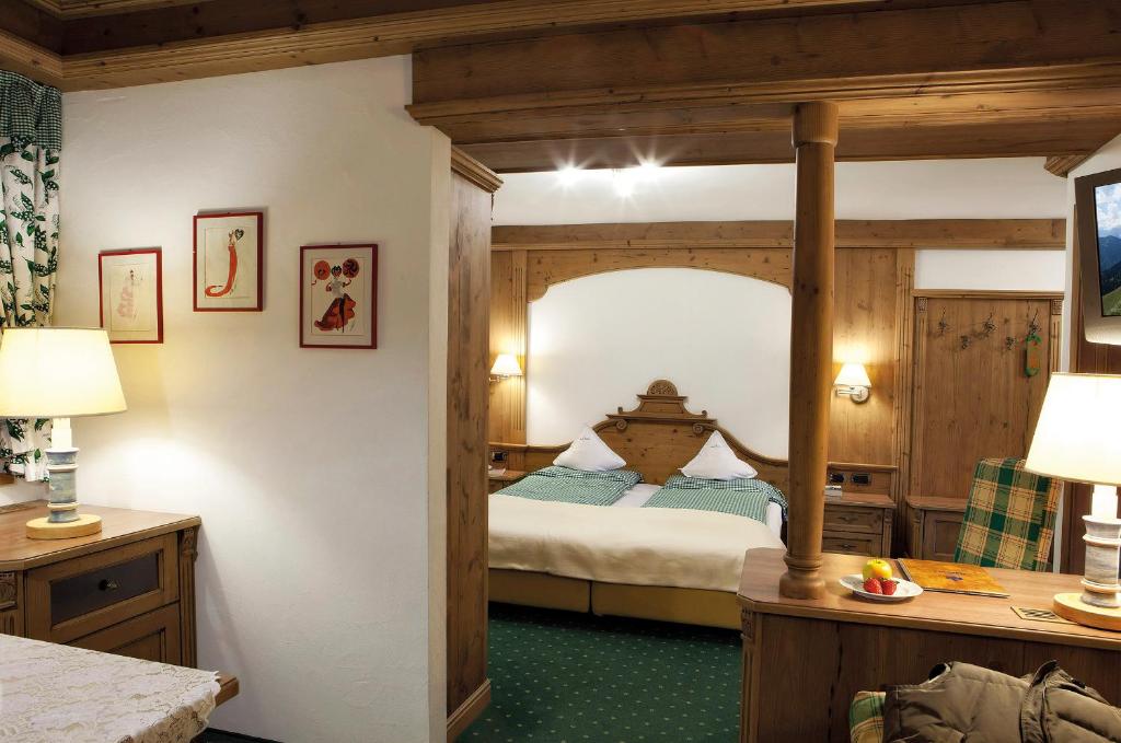 Postel nebo postele na pokoji v ubytování Chalet Barbara