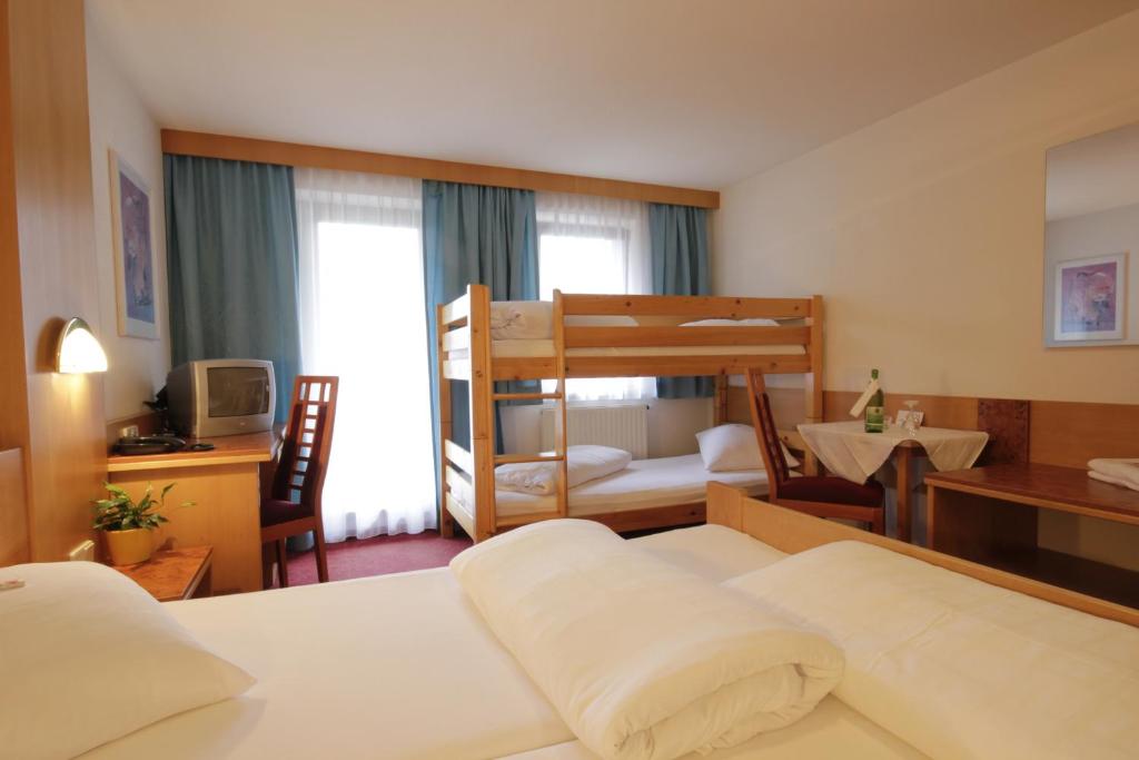 Postel nebo postele na pokoji v ubytování Hotel Tia Monte