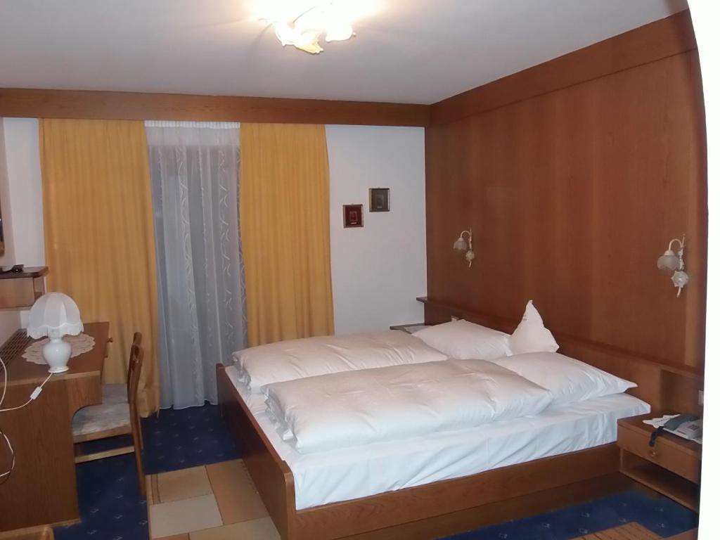 Postel nebo postele na pokoji v ubytování Hotel Pausa