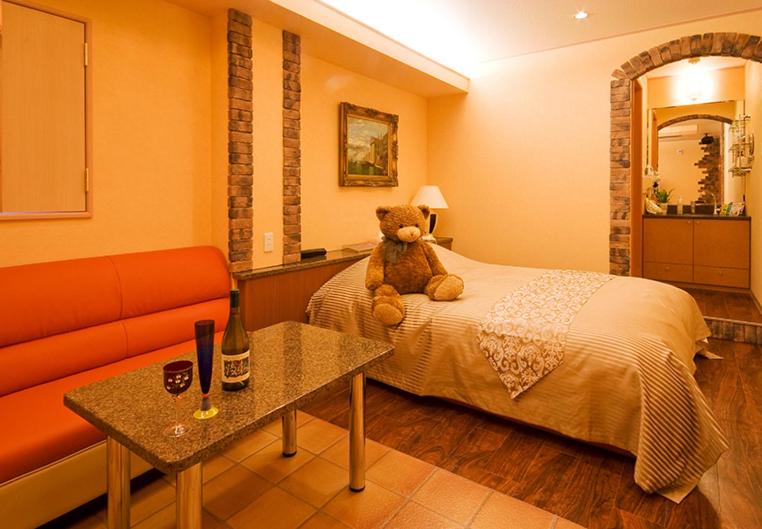 Postel nebo postele na pokoji v ubytování Hotel TO