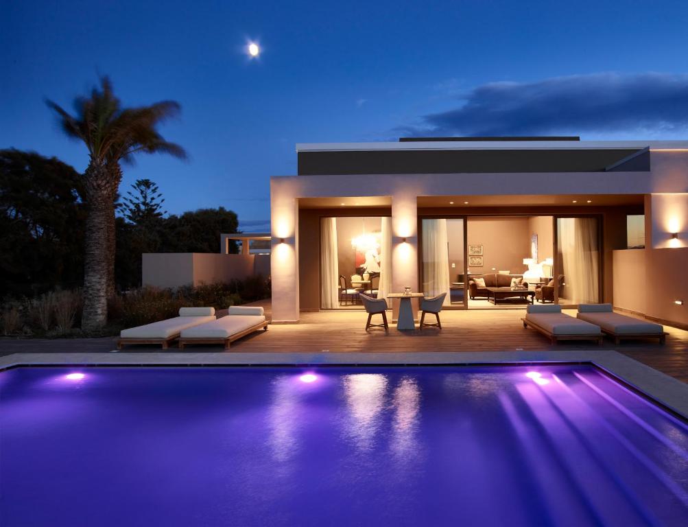 The swimming pool at or close to Pelagos Suites Hotel & Spa