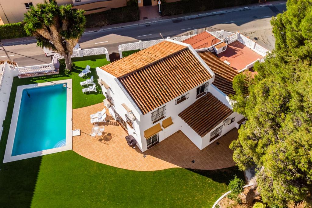 an overhead view of a house with a swimming pool at Villa Orquidea in Fuengirola