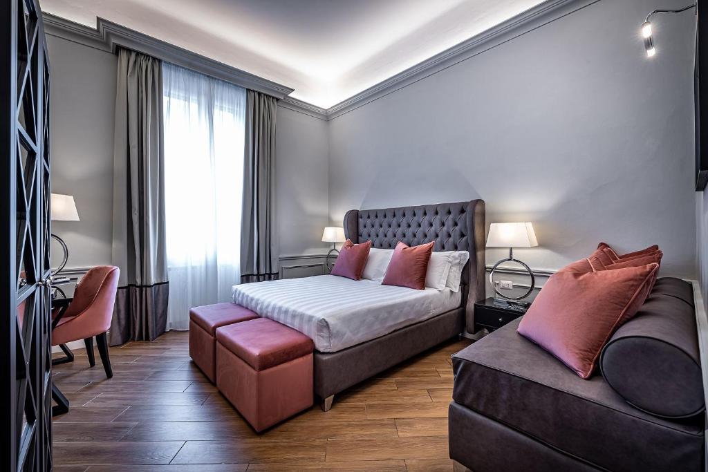 Postelja oz. postelje v sobi nastanitve Hotel Ungherese Small Luxury Hotel
