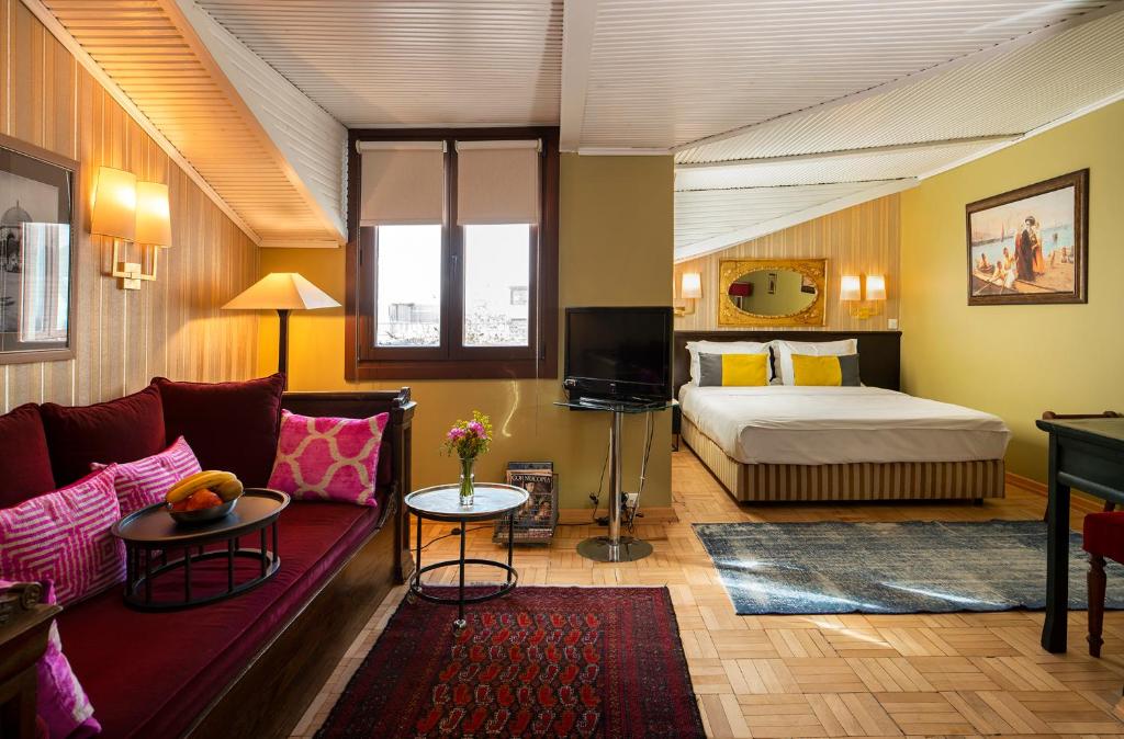 Postel nebo postele na pokoji v ubytování Hotel Ibrahim Pasha
