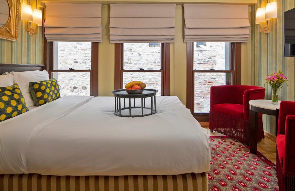 Postel nebo postele na pokoji v ubytování Hotel Ibrahim Pasha