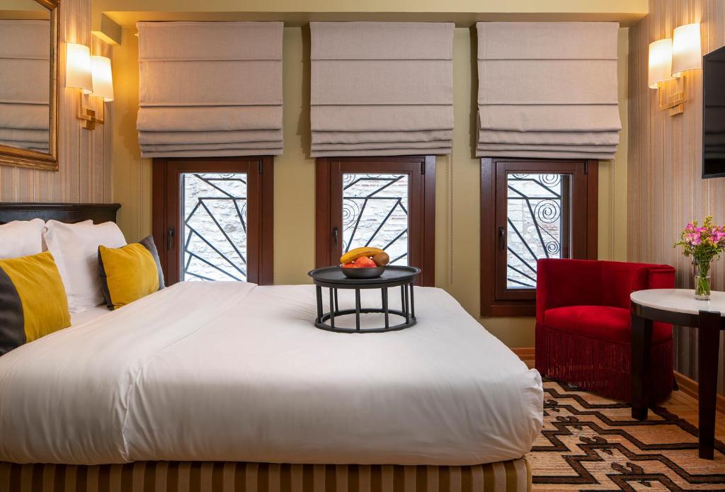 Postel nebo postele na pokoji v ubytování Hotel Ibrahim Pasha