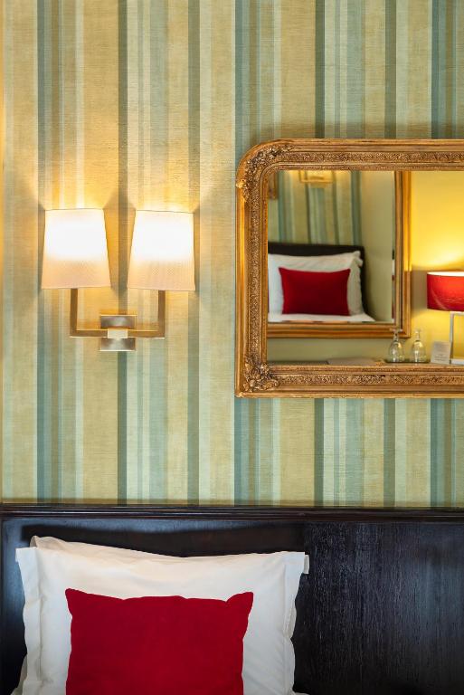 Postel nebo postele na pokoji v ubytování Hotel Ibrahim Pasha