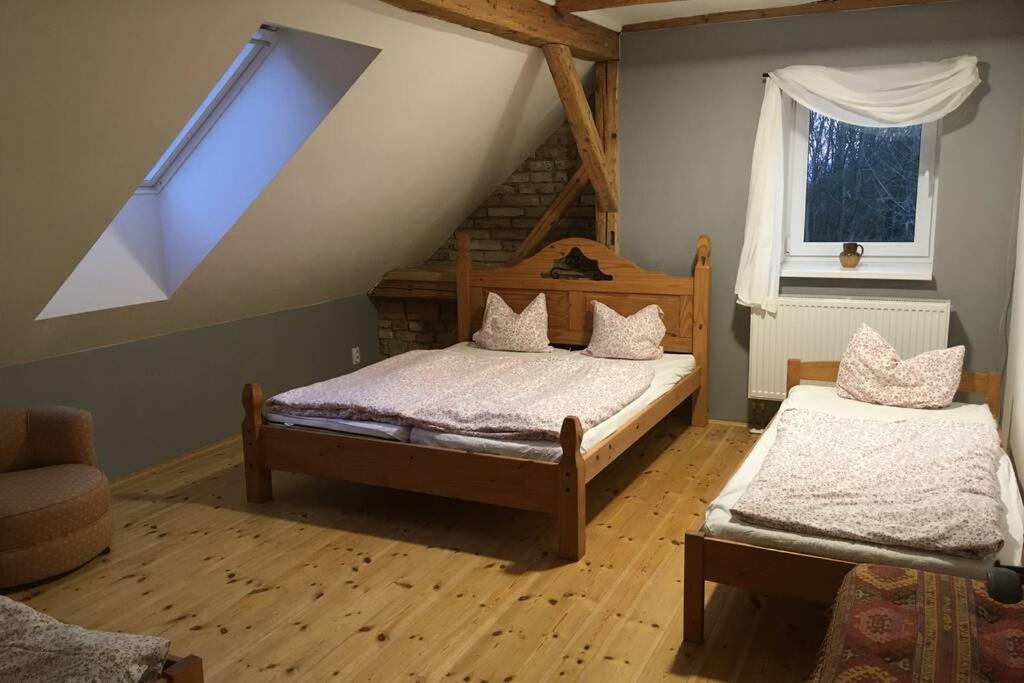 Postel nebo postele na pokoji v ubytování Villa Vykmanov