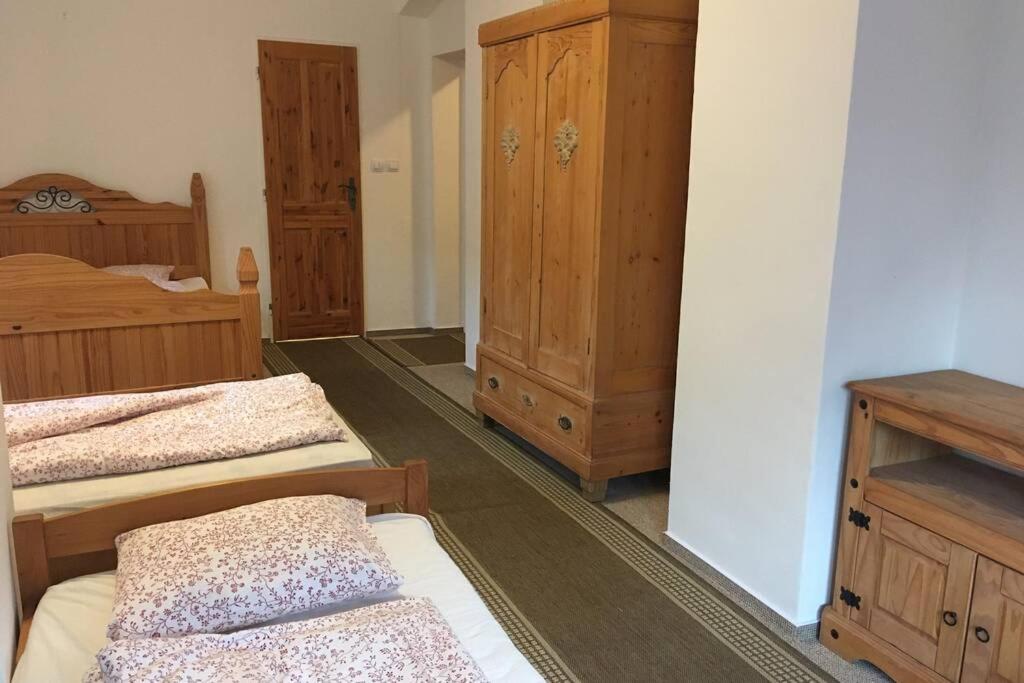 Postel nebo postele na pokoji v ubytování Villa Vykmanov