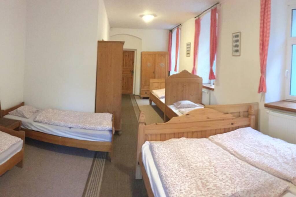 Postel nebo postele na pokoji v ubytování Villa Vykmanov