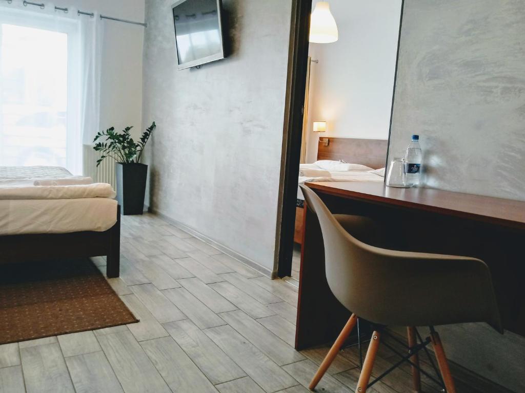 Voodi või voodid majutusasutuse Hotel Miłosz Restauracja, Basen dla dzieci, Sala Zabaw, Siłownia toas