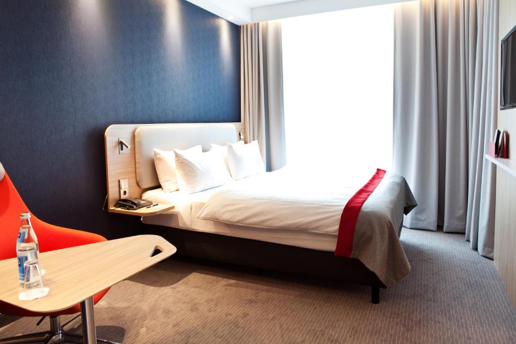 Postel nebo postele na pokoji v ubytování Holiday Inn Express - Trier by IHG
