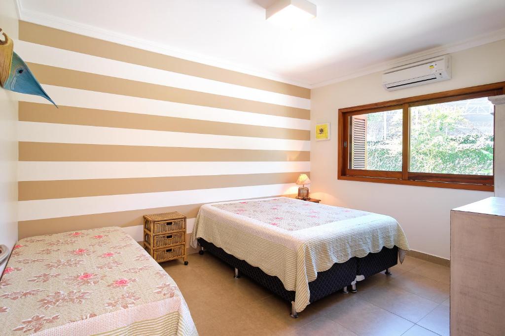  BH25 - CASA DE CINEMA A 30 METROS DA PRAIA!!!