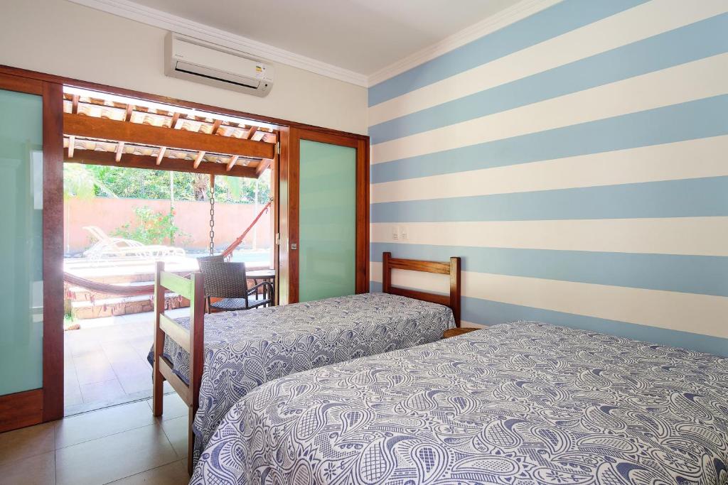  BH25 - CASA DE CINEMA A 30 METROS DA PRAIA!!!