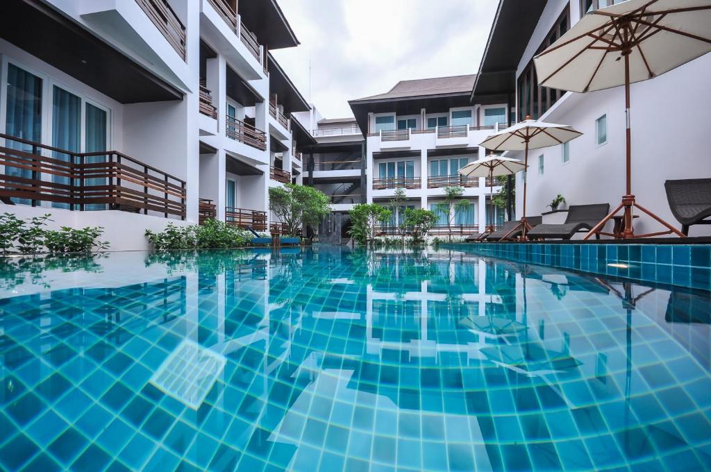 Bazén v ubytování Le Patta Resort & Hotel Chiang Rai nebo v jeho okolí