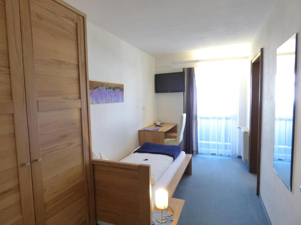 Postel nebo postele na pokoji v ubytování Panoramahotel