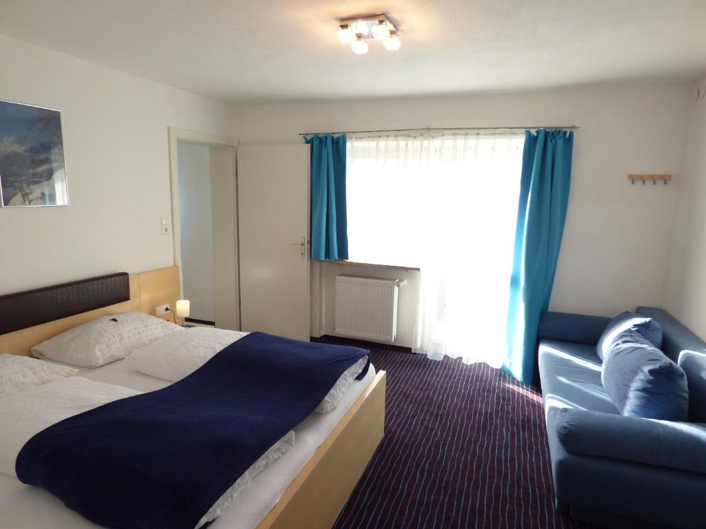 Postel nebo postele na pokoji v ubytování Panoramahotel