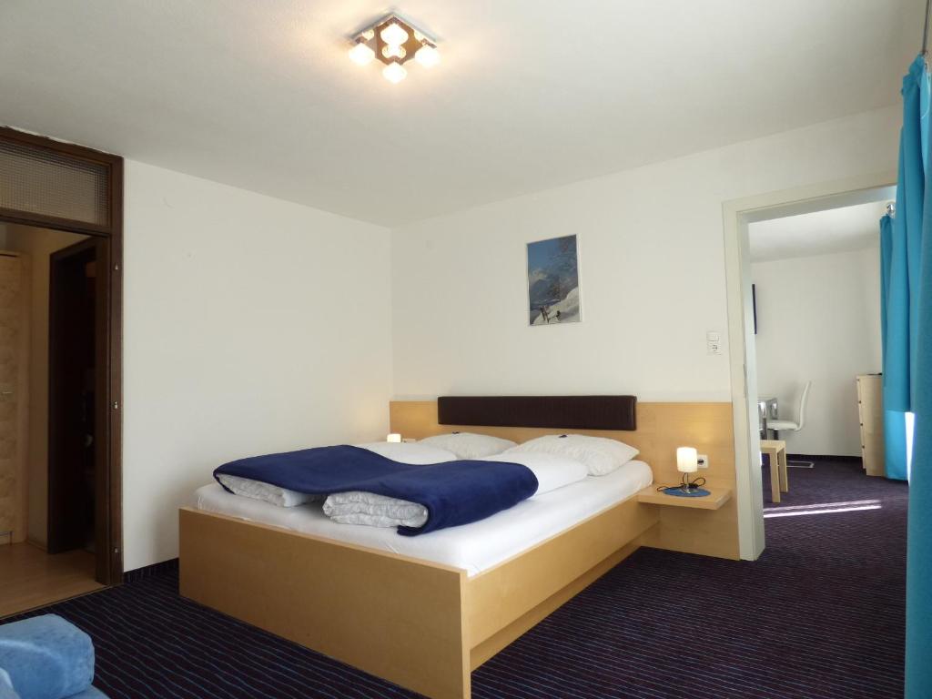 Postel nebo postele na pokoji v ubytování Panoramahotel
