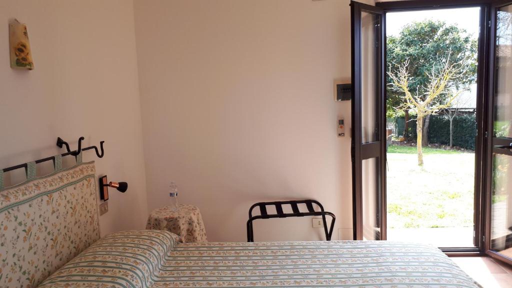 Agriturismo La Talpa - トリプルルーム ガーデンビュー