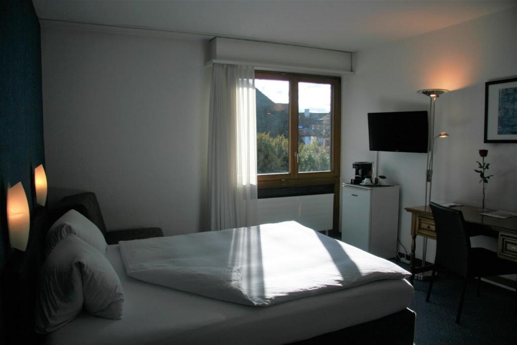 Postelja oz. postelje v sobi nastanitve Hotel Eremitage