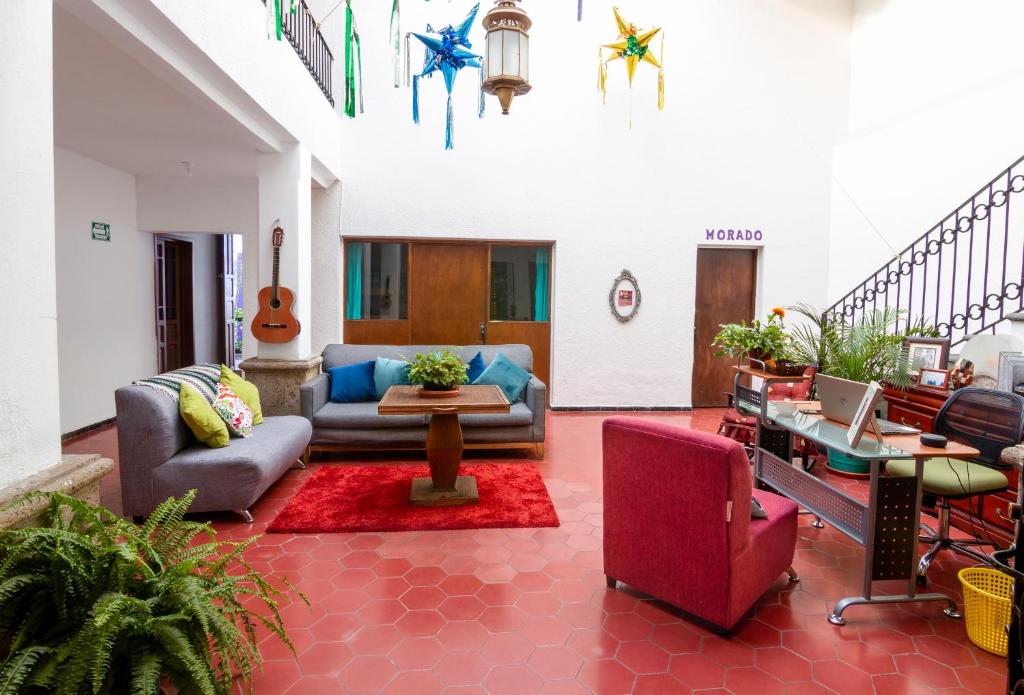 Posezení v ubytování Hostal Casa Colores Adults Only