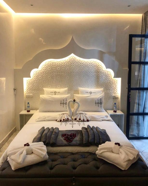 Postel nebo postele na pokoji v ubytování RIAD NOLITA & SPA Kasbah