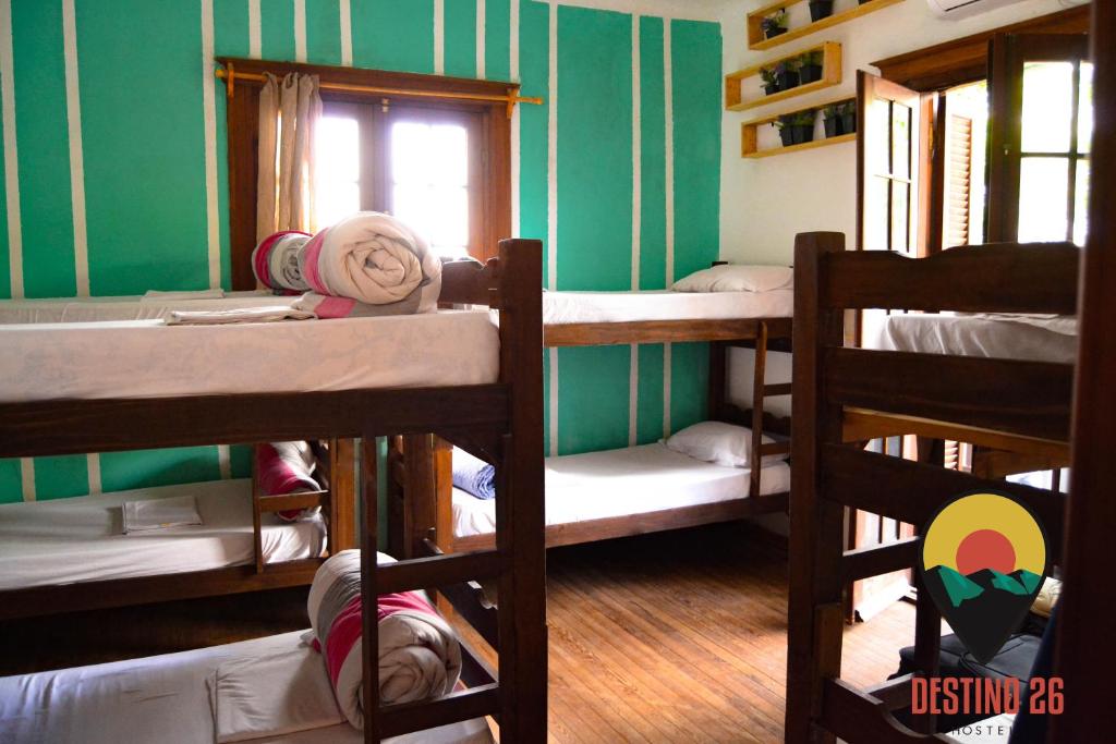 Destino26 Hostel - 8床の混合寮の部屋のベッド