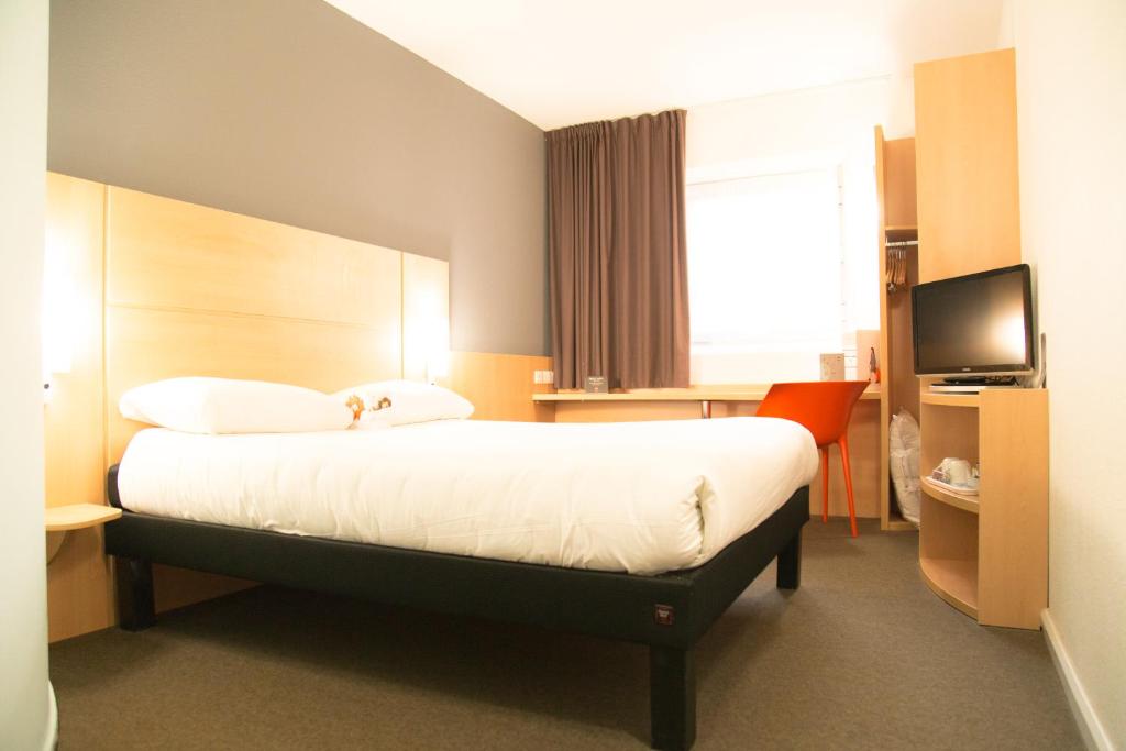 Postel nebo postele na pokoji v ubytování ibis Hull City Centre