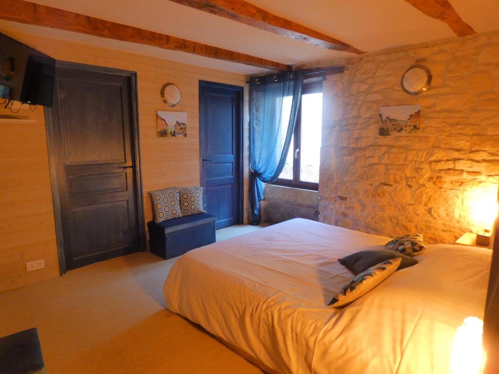 Postel nebo postele na pokoji v ubytování Auberge du Lac