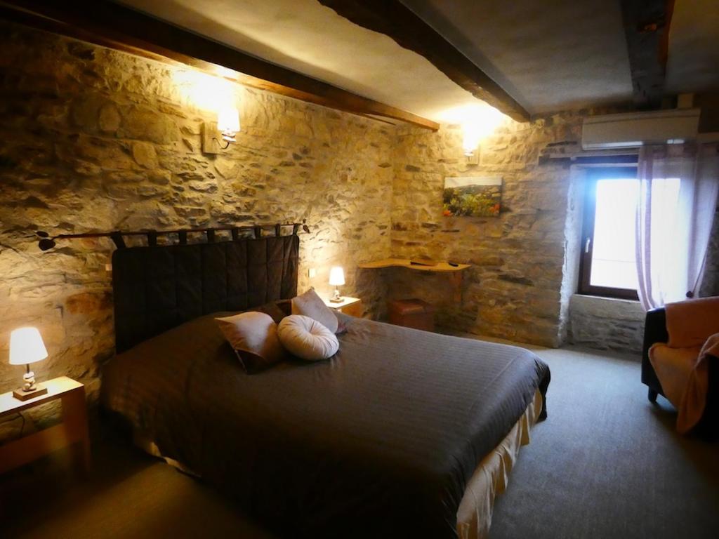 Postel nebo postele na pokoji v ubytování Auberge du Lac