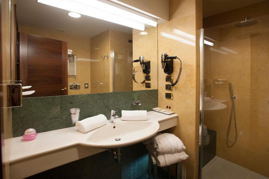 Koupelna v ubytování Hotel Calissano