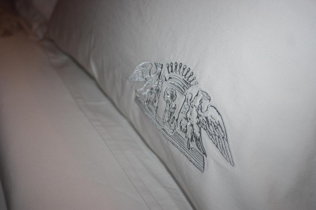 a sticker on the side of a white bed at Château Sigalas Rabaud in Bommes