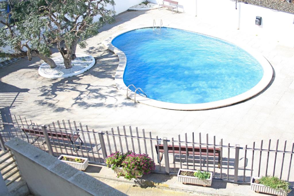 Bazén v ubytovaní Sol Daurat seafront apartment alebo v jeho blízkosti