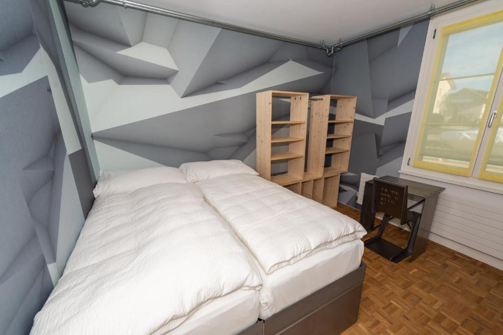Postel nebo postele na pokoji v ubytování Boutique Hotel BS16 before Bern City Parking gratis