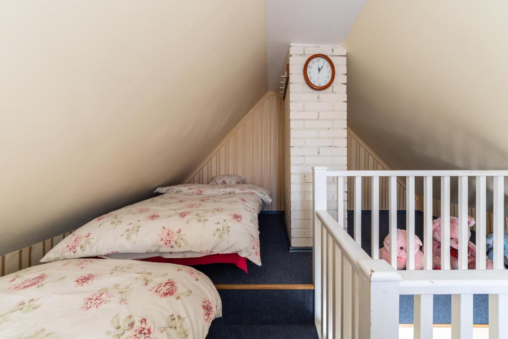 Postel nebo postele na pokoji v ubytování Videviku Villa Apartments