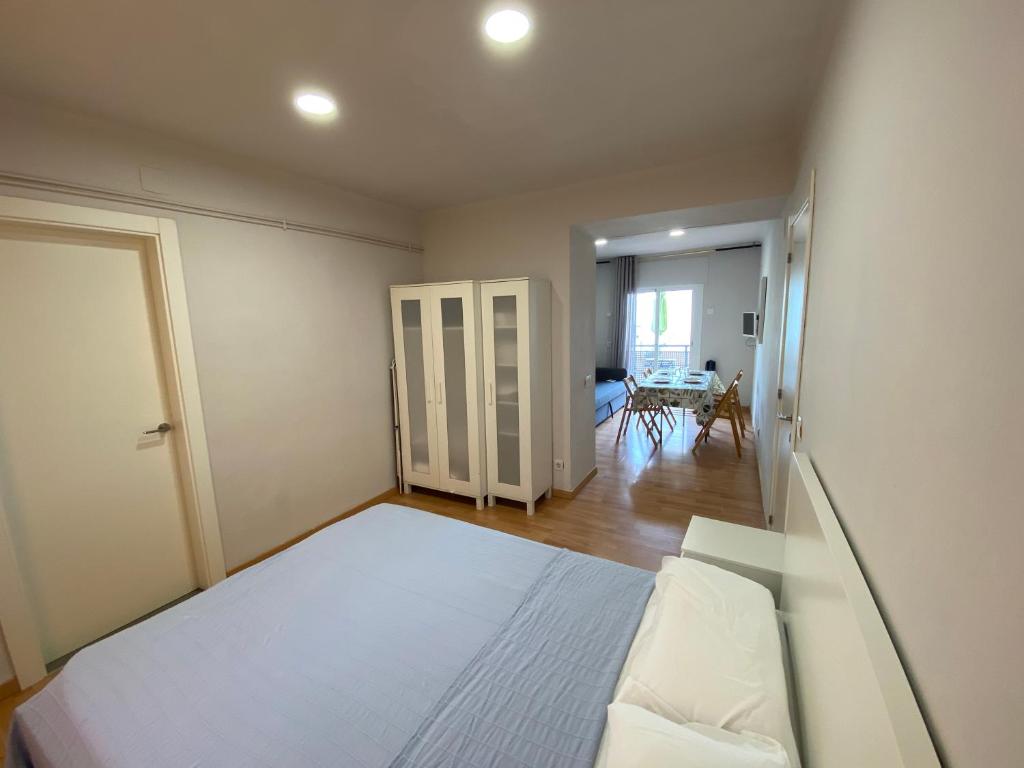 Postel nebo postele na pokoji v ubytování Estudis Laura