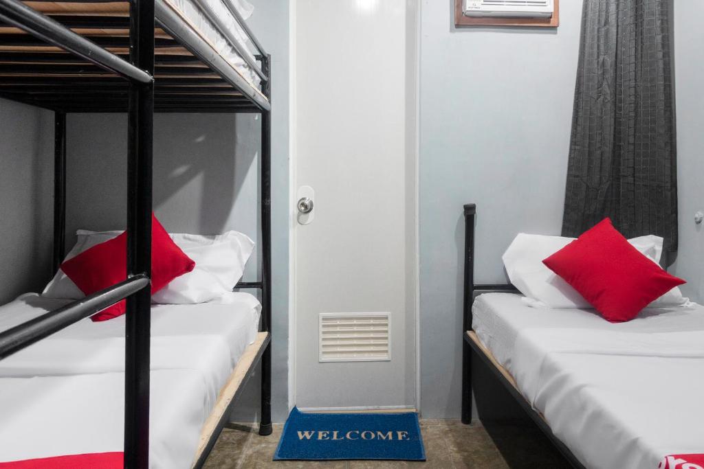 Postel nebo postele na pokoji v ubytování Abn Hostel