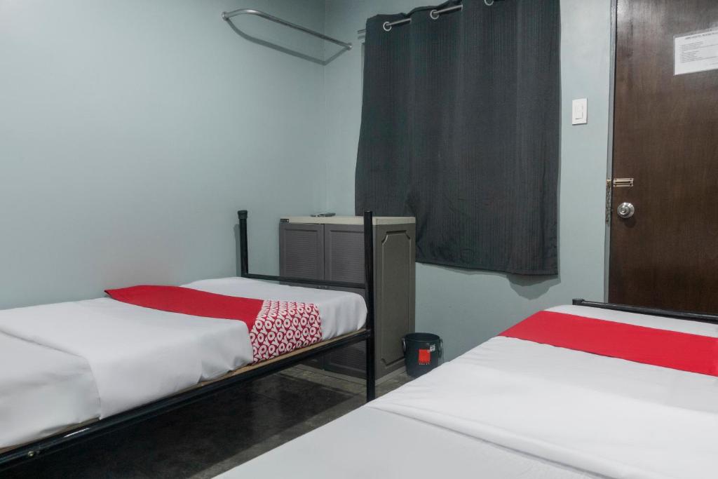 Postel nebo postele na pokoji v ubytování Abn Hostel