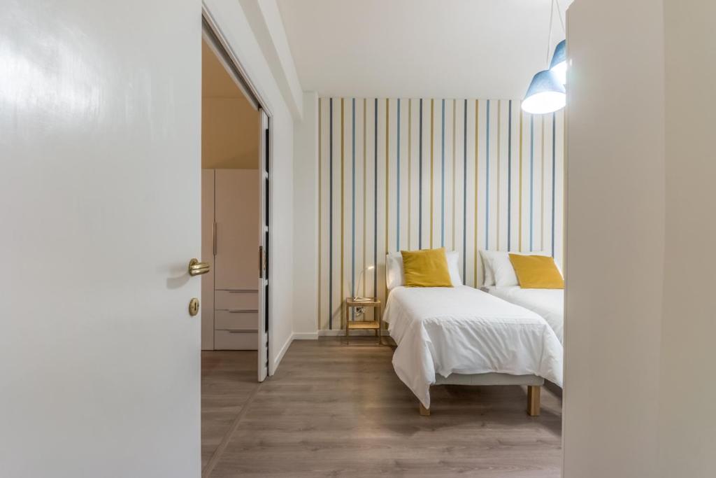 Postel nebo postele na pokoji v ubytování Domus Colli Albani