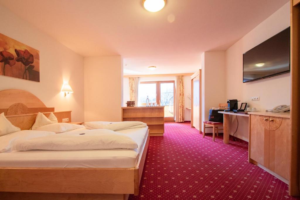 TV a/nebo společenská místnost v ubytování Superior Hotel Persal