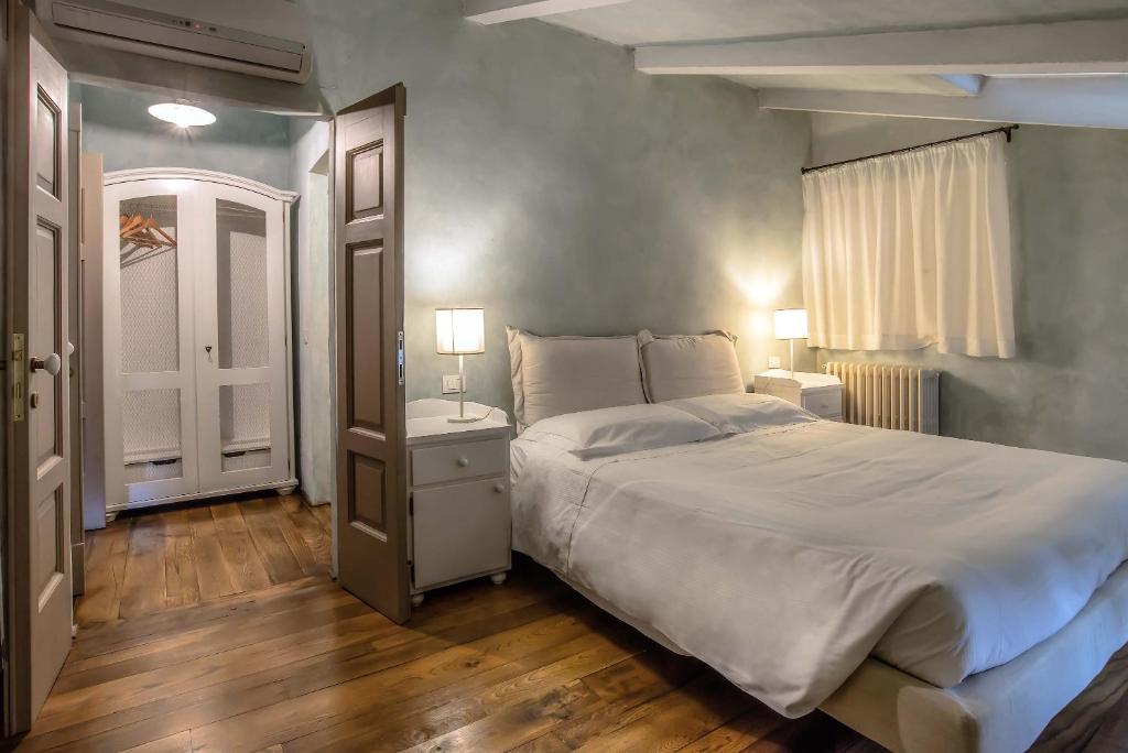 Postel nebo postele na pokoji v ubytování Villa Cassia di Baccano