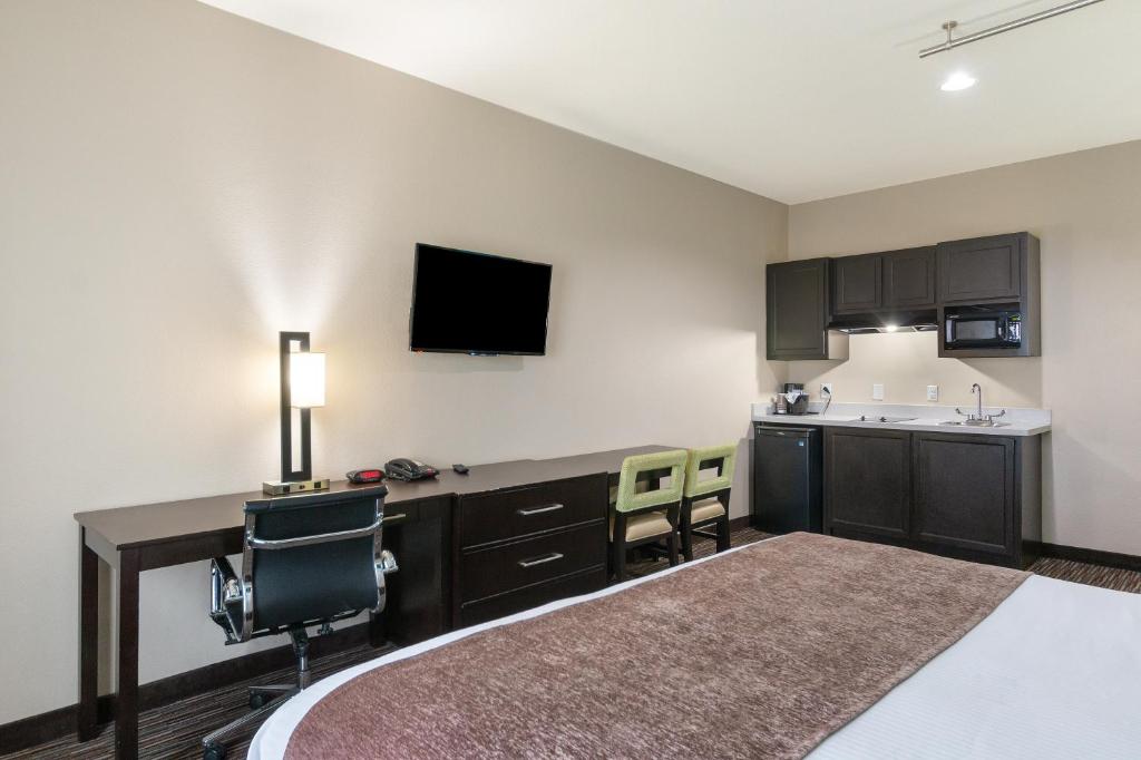 Kuchyň nebo kuchyňský kout v ubytování Residency Suites