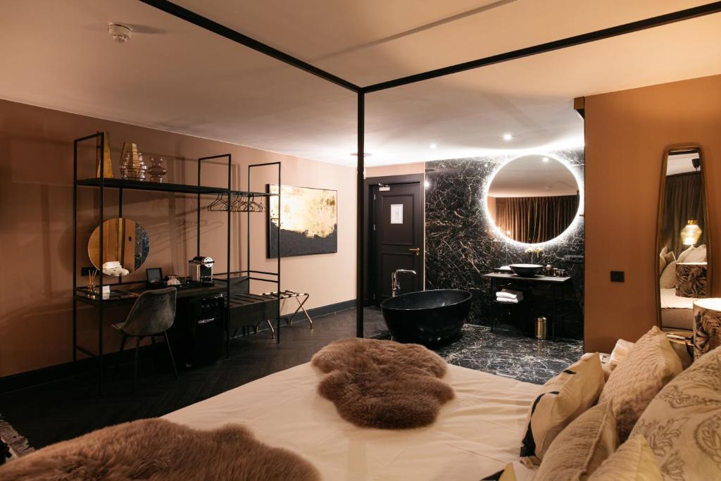 Postel nebo postele na pokoji v ubytování Hotel Britannique
