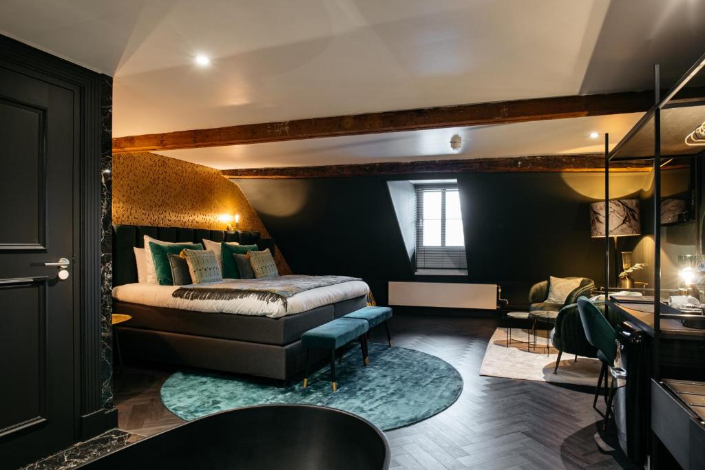 Postel nebo postele na pokoji v ubytování Hotel Britannique