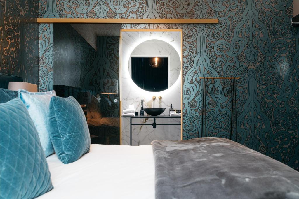 Postel nebo postele na pokoji v ubytování Hotel Britannique