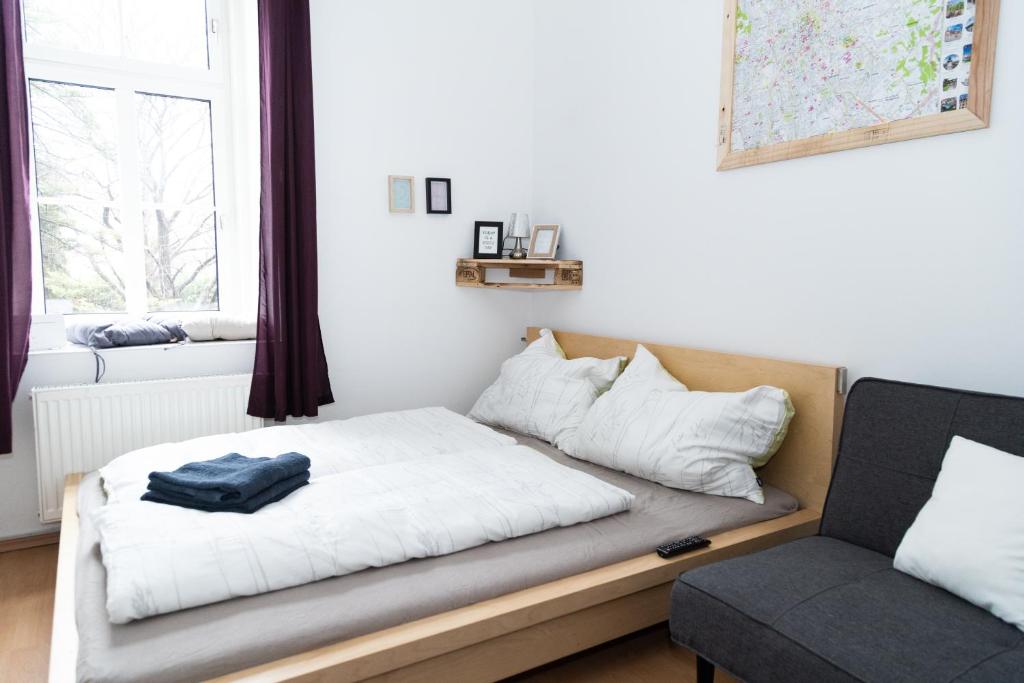 Posteľ alebo postele v izbe v ubytovaní Cozy & quiet Apartment close to Hauptbahnhof Graz