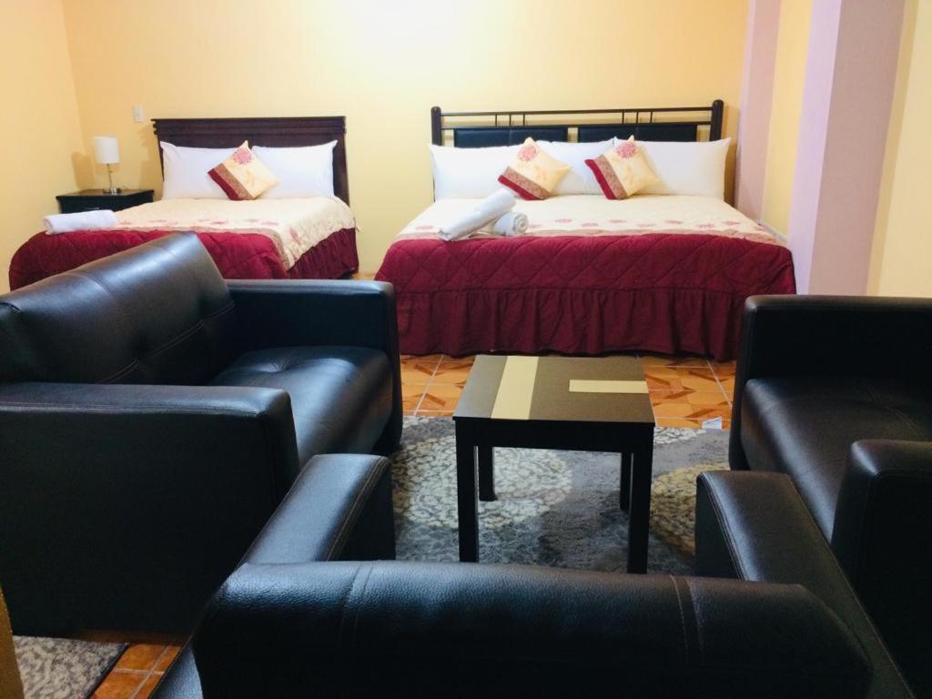 Postel nebo postele na pokoji v ubytování HOTEL EDELMIRA